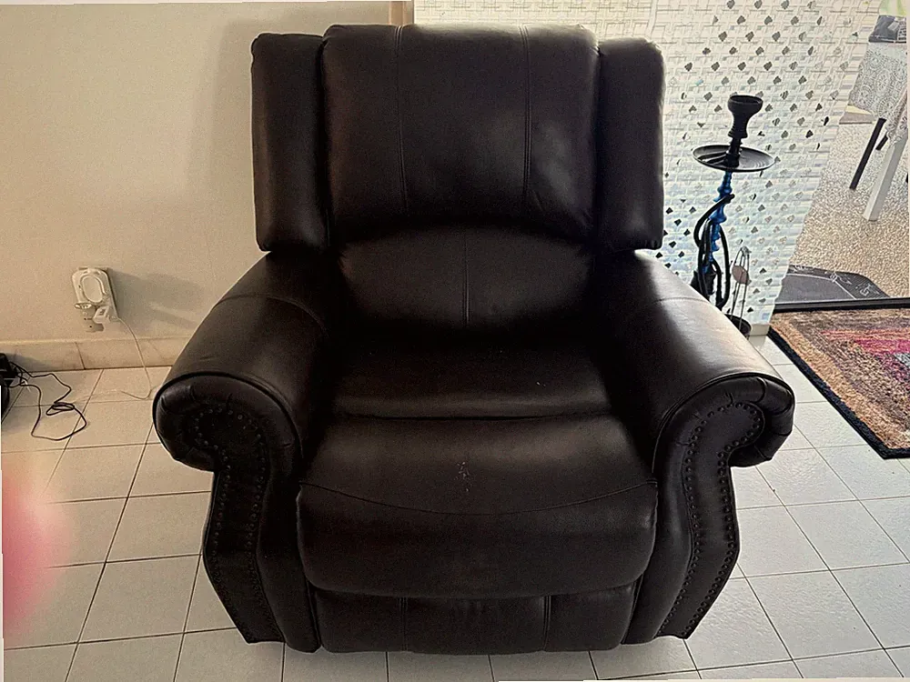 two brown leather recliners